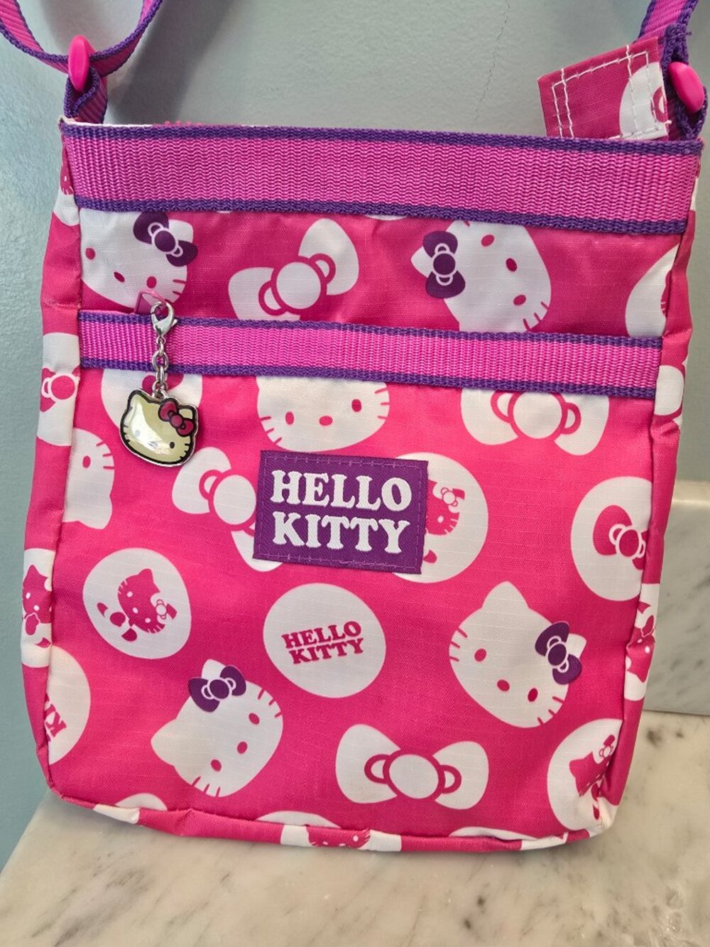 NWOT Sanrio Hello Kitty Pink, Purple & White Print Crossbody Bag